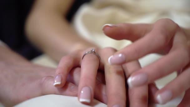 Bride and groom holding hands — Stock Video