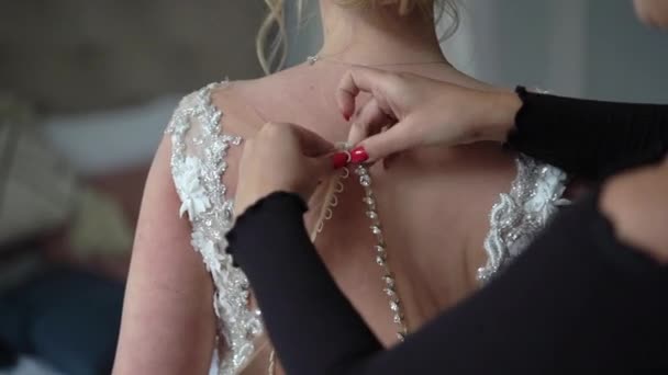 Buttoning bridal wedding dress — Stock Video