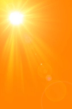 Sunny summer background with the bright sun on an orange background clipart