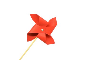 Red pinwheel on a white background.Toy for child. clipart