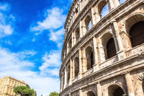 Colosseum in Rome against blue sky. Rome architecture and landmark. Italy.