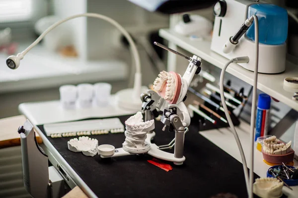 Prototypes of false teeth, creation of teeth, devices of prosthetics