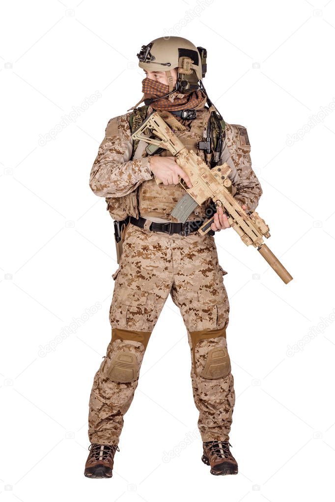 Special forces soldier with rifle on white background. army, military and people concept
