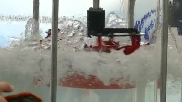 容器中的旋转水 — 图库视频影像