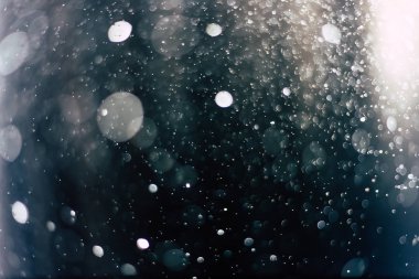 Bokeh su sineği ve ışıklar açık siyah ve mavi arka plan, arka plan bütün bokeh daireler için arka plan renkleri.
