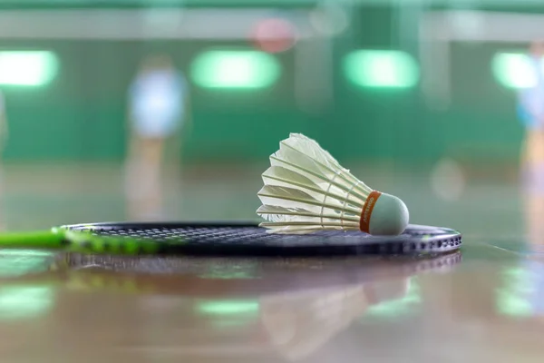 Badminton racket with blurred background