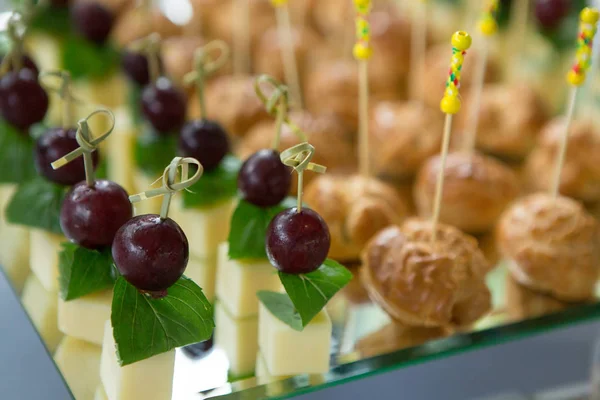 Catering Food Wedding Event Table. Buffet line in Wedding. Delicious appetizer close-up.