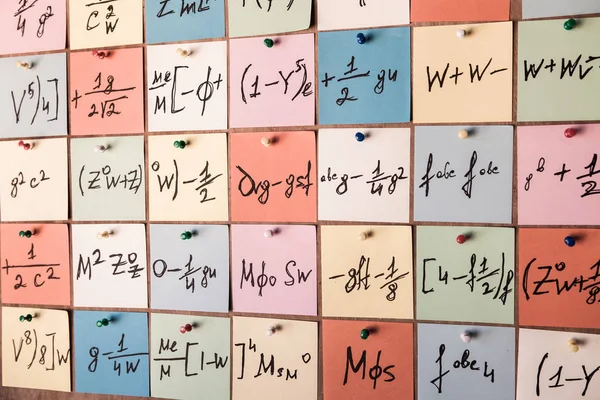 Mathematical equations and formulas on stickers.Background with numbers. Numbers texture