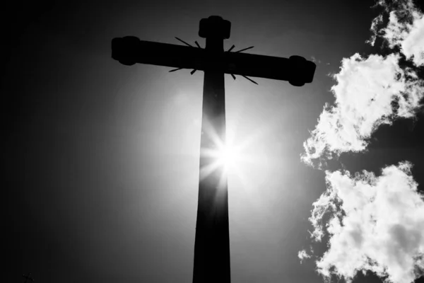 Concept cross religion symbol silhouette over sky. Christian religion background concept. The cross symbol for Jesus Christ.