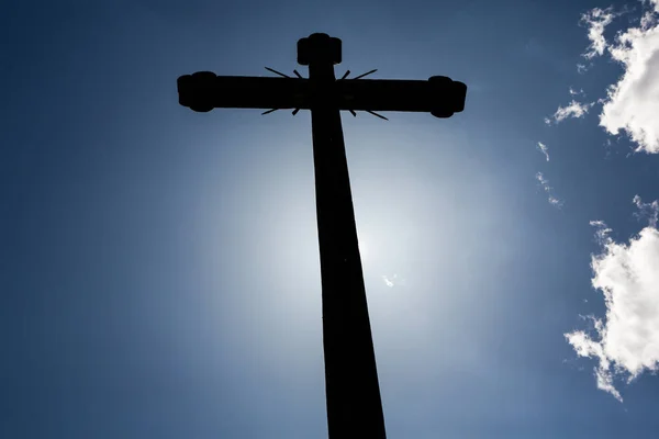 Concept cross religion symbol silhouette over sky. Christian religion background concept. The cross symbol for Jesus Christ.