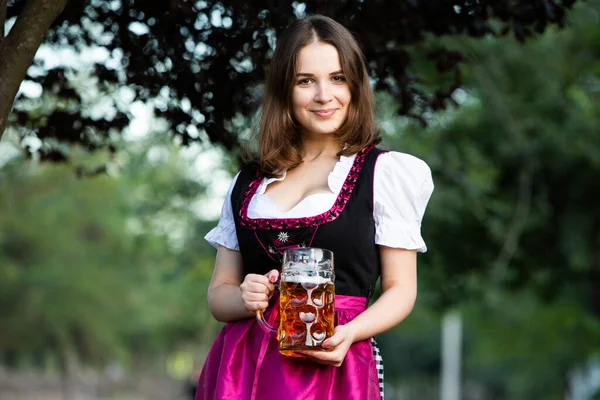 Beautiful Oktoberfest Girl Wearing Traditional Bavarian Dress Holding Beer Mugs — Stock Photo, Image