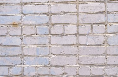 Beyaz tuğla duvar arka plan. Taştan bir duvar dokusu. Tuğla duvar beyaz renkte boyalı