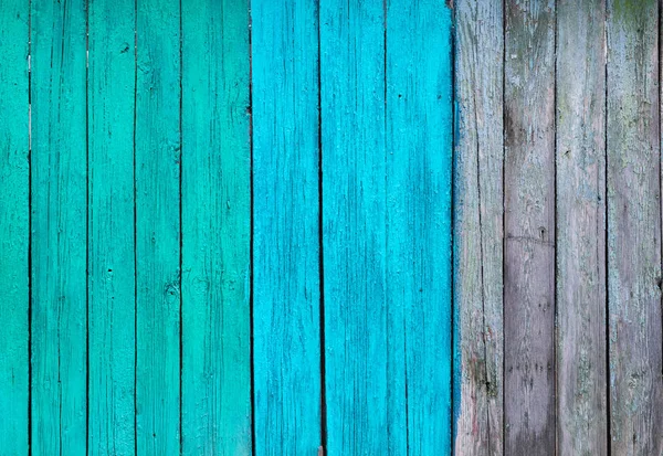 Teilweise bemalt in Blau- und Türkistönen von alten Holzplanken — Stockfoto