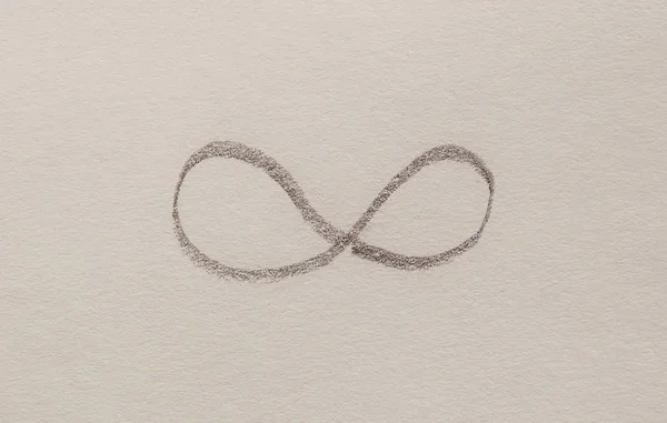 simple symbol of eternity, pencil drawing on paper.
