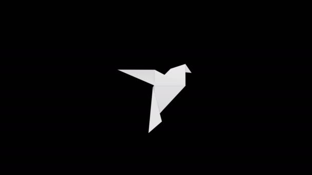 White paper origami bird flaps its wings flies on black background — Stock Video