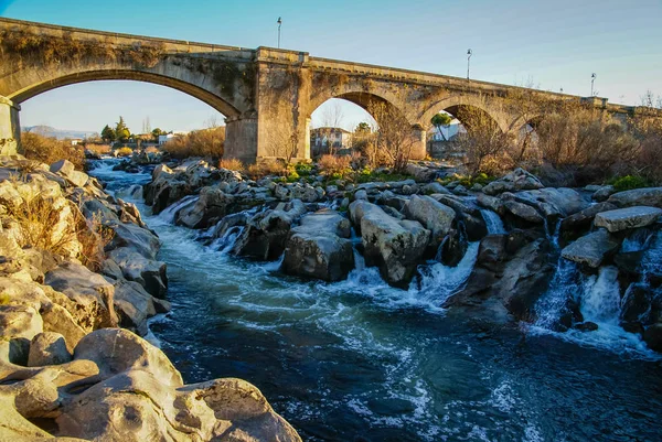 Picturesque landscape with medieval bridge over Tormes River in Castilla y Leon in Spain