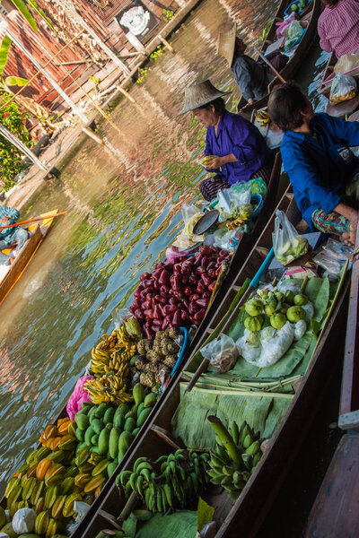 Bangkok, Thailand - January 02, 2011 : Damnoen Saduak floating market, famous attraction of Ratchaburi province, Thailand