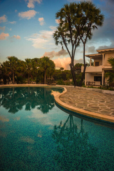 Beautiful landscape and its reflection in  blue waters of  lake 