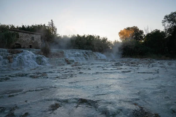 Saturnian natural spa with waterfalls and hot springs at  thermal baths in Tuscany in Italy