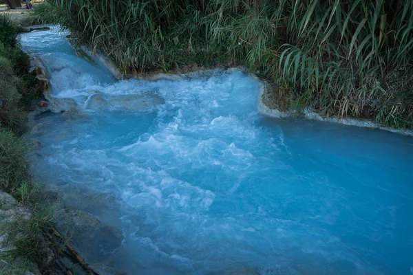 Saturnian natural spa with waterfalls and hot springs at  thermal baths in Tuscany in Italy