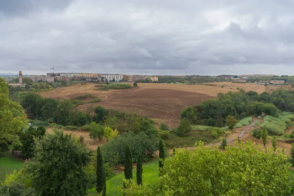 Roman landscape after rain, pure bright colors in cloudy weather, Italy