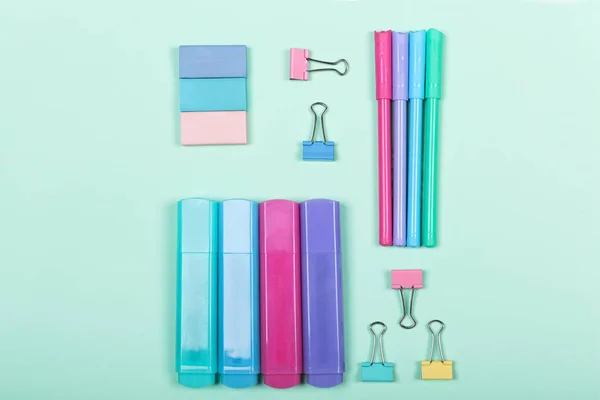 Back to school shopping concept. Pastel colored school supplies on paper background. Flat lay, top view, copy space. — Stock Photo, Image