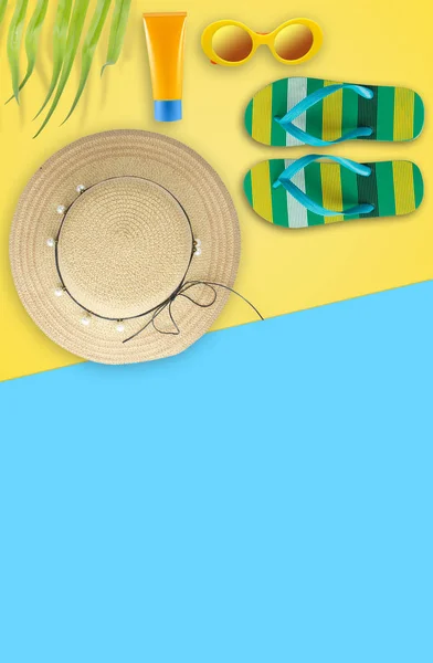 Vacation and travel items. Flipflop, Sun glassed, Straw hat and  Sunblock on yellow and blue background with copy space.