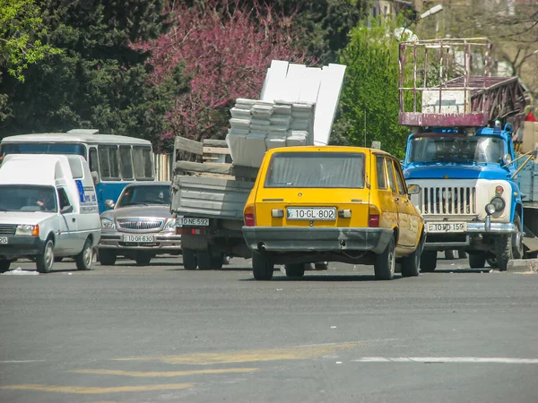 Azerbaijan, Baku - May 03, 2007: Car GAZEL that is overload by construction materials — Stock Photo, Image