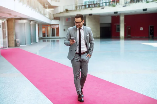 Handsome Full Confidence Young Businessman Walking Modern Building Checking His — Stock Photo, Image