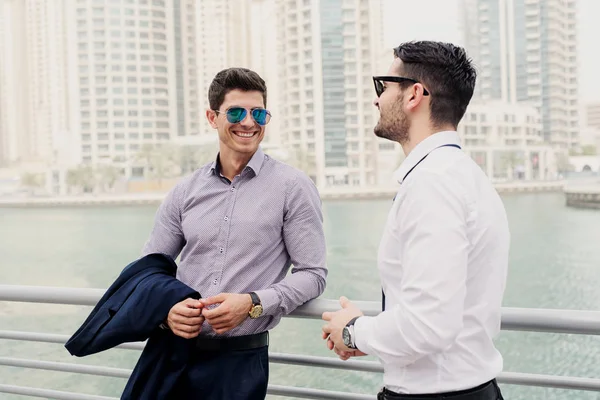 Two Young Successful Businessmen Dubai Marine Walking Talking — Stock Photo, Image