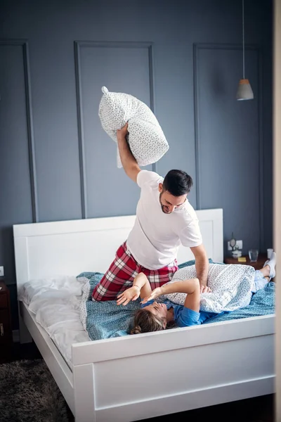Happy Funny Young Cheerful Couple Having Pillow Fight Bedroom — Stock Photo, Image