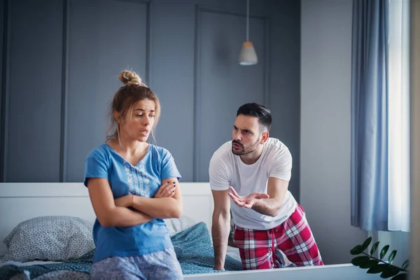 Young Angry Blonde Woman Sitting Bed Her Serious Boyfriend Young — Stock Photo, Image