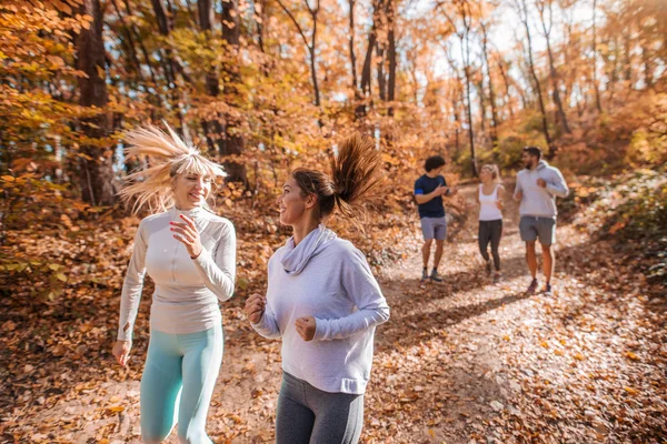 Organized Small Group People Running Woods Autumn — Stock Photo, Image