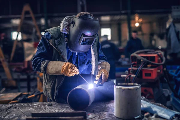 Worker Welding Iron Protective Suit Mask Workshop Interior — Stock Photo, Image