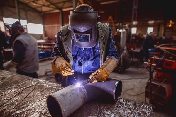 Worker Welding Iron Protective Suit Mask Workshop Interior — Stock Photo, Image