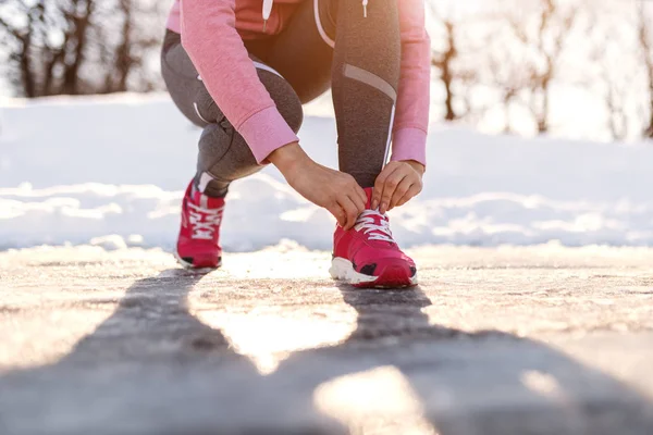 Close Caucasian Woman Crouching Adjusting Sneaker Running Outdoors Wintertime Snow — Stock Photo, Image