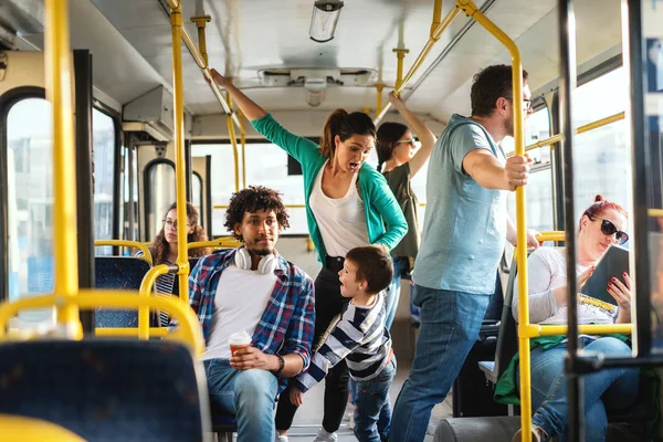 Young Mother Her Son Trying Fall Bus Full People — Stock Photo, Image