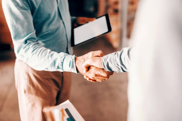 Close Two Modern Businessman Shaking Hands Good Negotiations Standing Warehouse — Stock Photo, Image