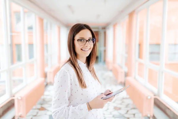 Portrait Young Smiling Caucasian Female Teacher Eyeglasses Using Tablet Looking — Stock Photo, Image