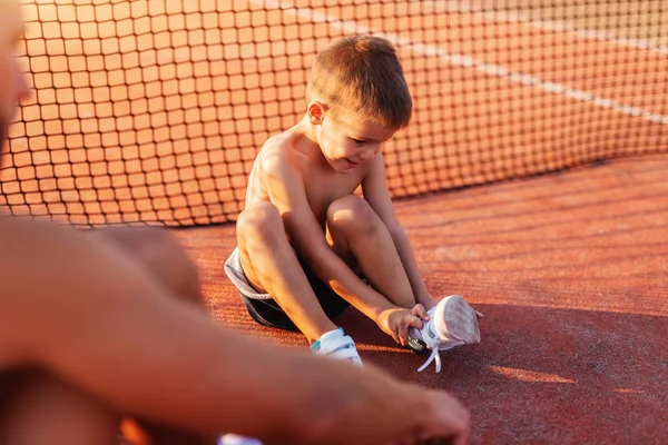 Little Shirtless Sporty Boy Putting Sneakers While Sitting Court Morning — Stock Photo, Image