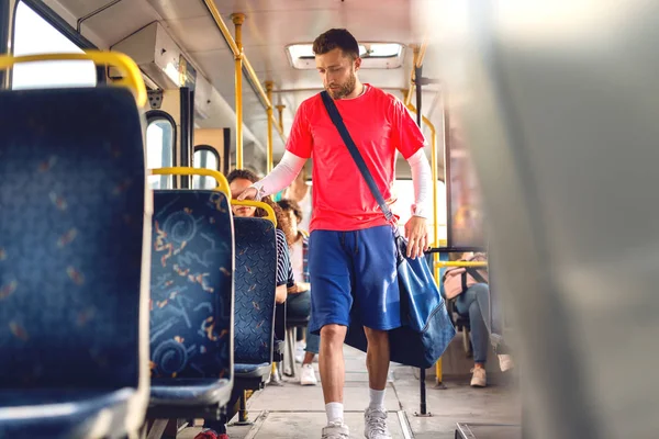 Young Man Taking Sit Bus Carrying Sports Bag — Stock Photo, Image