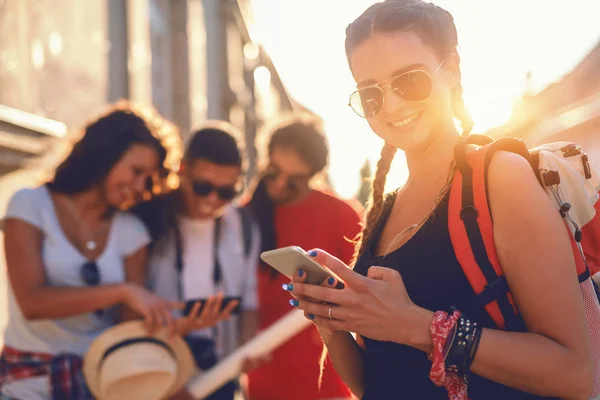 Group Young Excited Tourists Looking Telephone Sunny Day — Stock Photo, Image