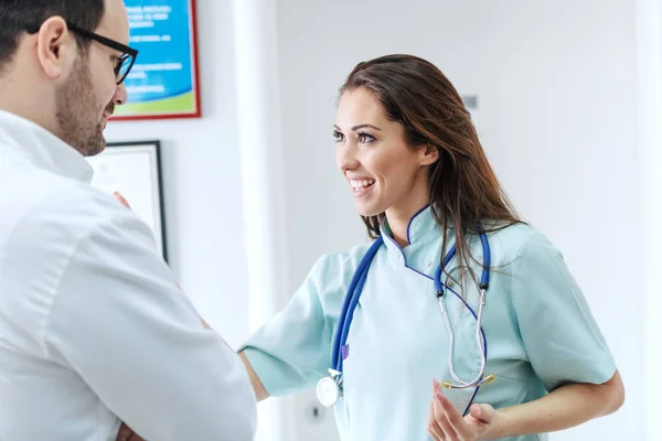 Smiling Nurse Long Brown Hair Stethoscope Neck Talking Doctor Job — Stock Photo, Image