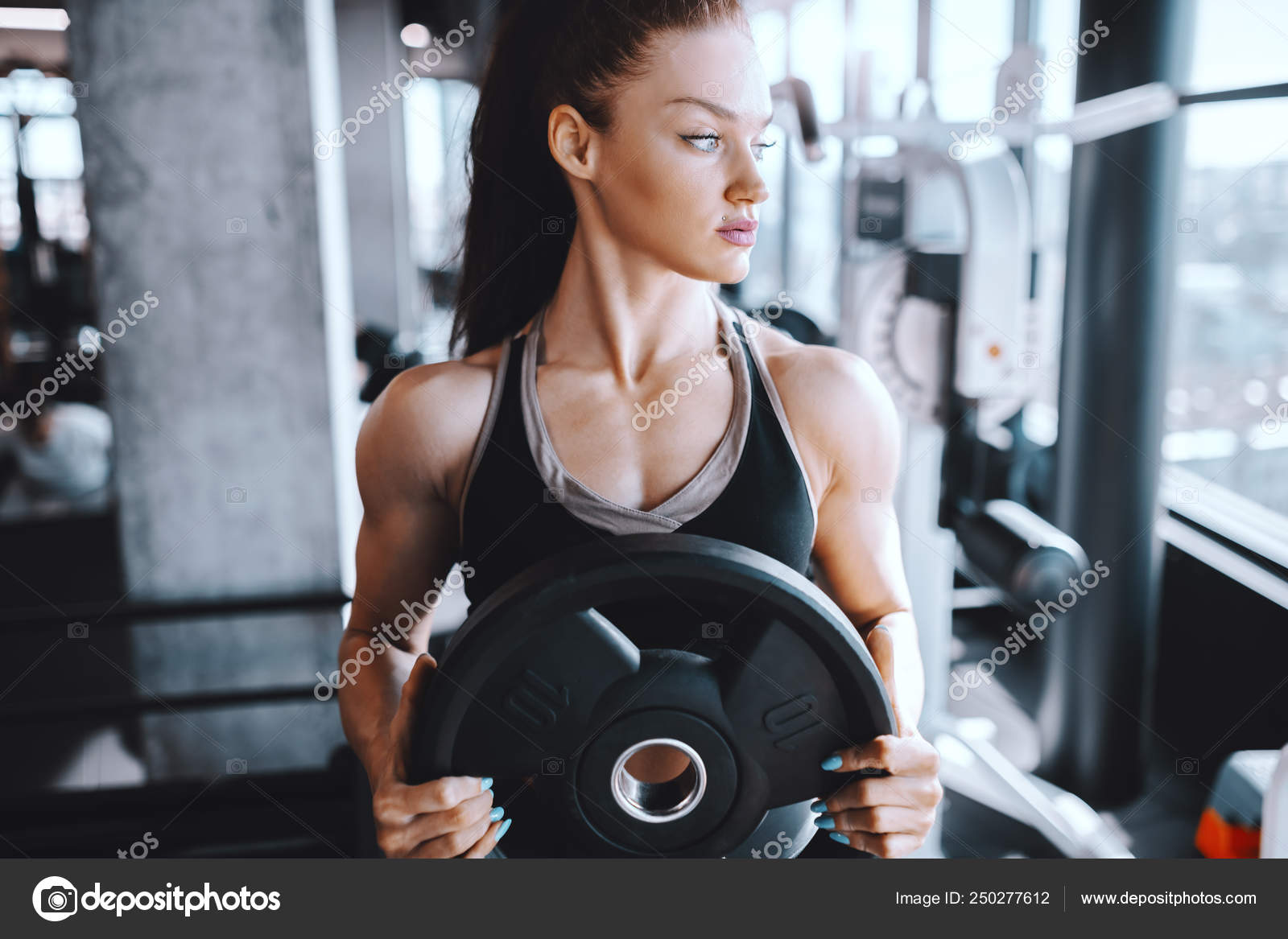 https://st4.depositphotos.com/4259987/25027/i/1600/depositphotos_250277612-stock-photo-young-attractive-caucasian-female-bodybuilder.jpg