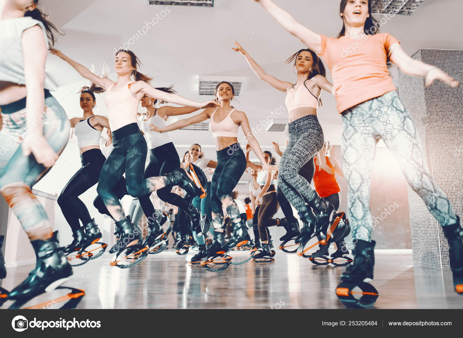 Female Trainer Doing Exercises Jumping In The Kangoo Jumps Boots Stock  Photo - Download Image Now - iStock