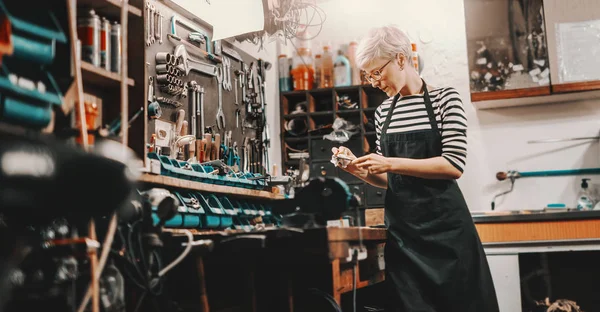 Beautiful Caucasian Female Worker Short Blonde Hair Eyeglasses Taking Tool — Stock Photo, Image