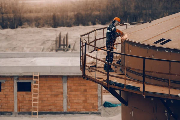 Worker Protective Uniform Helmet Grinding Top Tower Construction Site — 스톡 사진