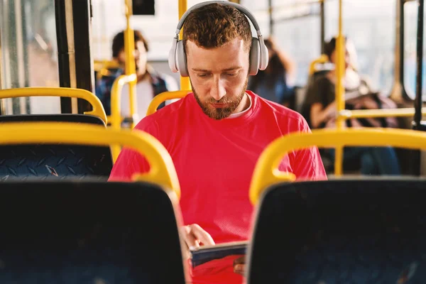 Young Man Listening Music Sitting Bus Searching Web — 스톡 사진