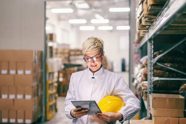 Young Caucasian Blonde Female Employee Protective Helmet Armpit Using Tablet — 스톡 사진