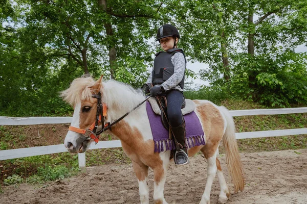 Caucasian Girl Helmet Protective Vest Riding Cute White Brown Pony — Stock Photo, Image